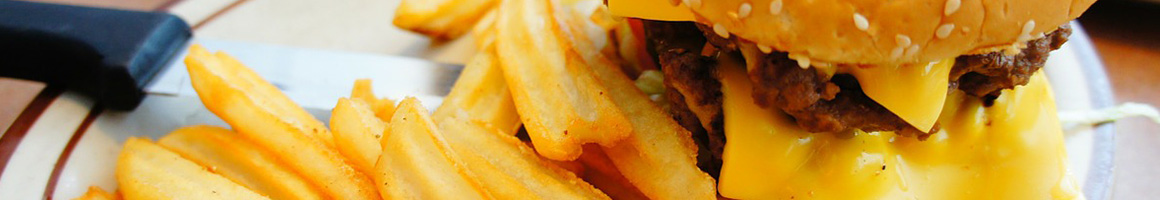 Eating Burger at Burger Pit restaurant in San Jose, CA.